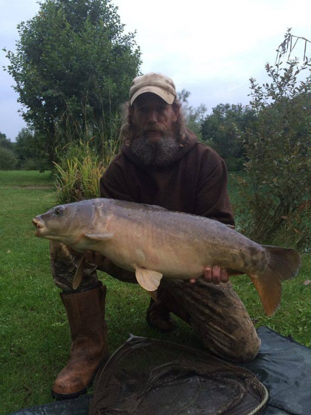 John and his 16.5lb Leather Carp