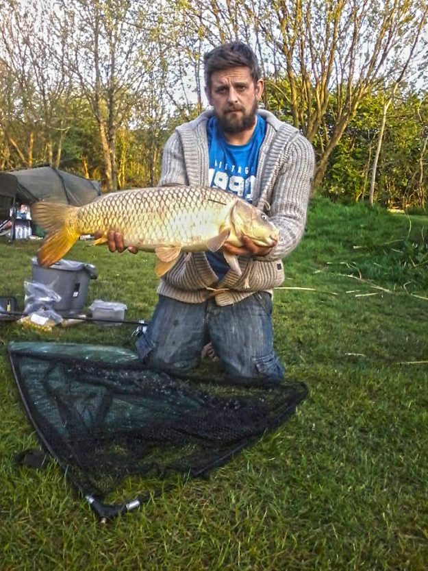 Dale and his beard looking proud of his 14.5lb Ghost carp