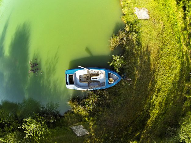 Lonely boat in the shallow end Fishing Totnes
