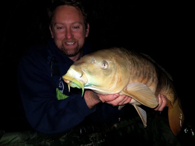 Tyson and a lovely Mirror Carp